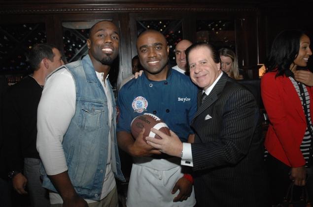 Mark Sherry with 2 Pro Football Players